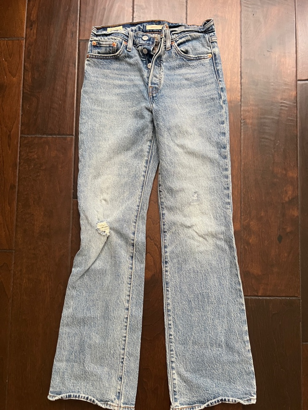 Levi's Light Blue Flared Jeans with Distressed Knee